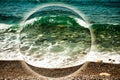 Wave on the pebble coast of sea. Collage. Toned