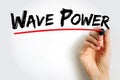 Wave Power is the capture of energy of wind waves to do electricity generation, water desalination, or pumping water, text concept