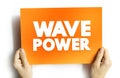 Wave Power is the capture of energy of wind waves to do electricity generation, water desalination, or pumping water, text concept