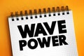 Wave Power is the capture of energy of wind waves to do electricity generation, water desalination, or pumping water, text concept