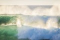 Big swell wave with white foam high energy impact perfect for surf and body board activity - danger with the ocean water - Royalty Free Stock Photo