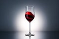 Wave of red wine in a glass Royalty Free Stock Photo