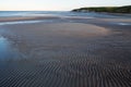 Wave ripples on a sandbank of the river. Royalty Free Stock Photo