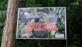 Wave Rock at Bukit Baginda Majau welcoming signboard at the hiking trail entrance Royalty Free Stock Photo