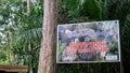 Wave Rock at Bukit Baginda Majau welcoming signboard at the hiking trail entrance Royalty Free Stock Photo