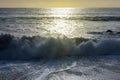 Rolling waves at sunset