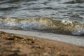 Wave rolling on the sandy shore of the Black Sea, Ukraine Royalty Free Stock Photo