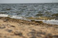 Wave rolling on the sandy shore of the Black Sea, Ukraine Royalty Free Stock Photo