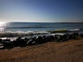 Wave on the sand beach - stones shore