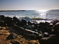 Wave on the sand beach - stones shore