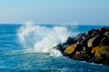 Wave Smashing in a Sprial off a Jetty Royalty Free Stock Photo