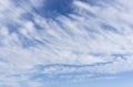 Wave of softy and white fluffy clouds under deep blue sky Royalty Free Stock Photo