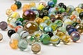 Wave of spilled colorful glass marbles Royalty Free Stock Photo