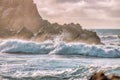 Wave splashes close-up. Crystal clear sea water hitting rock formations in the ocean in San Francisco Bay, blue water, pastel Royalty Free Stock Photo