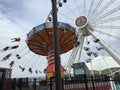 Wave Swinger Ride and Ferris Wheel, Navy Pier, Chicago, Illinois Royalty Free Stock Photo