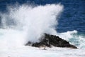 Waves against a cliff Royalty Free Stock Photo