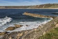 Waves approaching side of pier at Sennen Cove Royalty Free Stock Photo