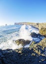 Waves crashing on rocky south coast of Iceland