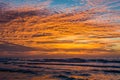 Waves in the Atlantic Ocean at sunrise, in Folly Beach, South Carolina Royalty Free Stock Photo