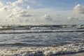 The waves of Baltic Sea with the cloudy sky