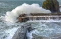 Waves batter the harbour, Mullion Cove, Cornwall Royalty Free Stock Photo