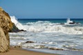 Waves beating against coastal rocks on the cliffs