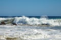 Waves beating against coastal rocks on the cliffs