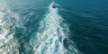 Waves behind the ship in calm water, the view from the height of the water surface , concept of Marine tranquility