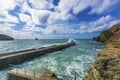 Waves braking on portreath breakwater at Cornwall