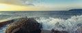 Sea Foam Waves Break On The Coastal Stones On Horizon Background
