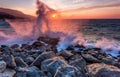 Waves break about coastal stones Royalty Free Stock Photo