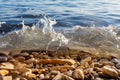 The waves break on the mini rocks Royalty Free Stock Photo