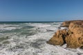 Waves breaking of cliffs near Oualidia lagoon in same name vill Royalty Free Stock Photo