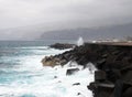 Waves breaking on the cliffs at puerto cruz