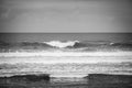 Waves breaking gently against the shore at Moledo Portugal