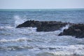 Waves breaking on the rocks of the coast Royalty Free Stock Photo