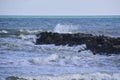 Waves breaking on the rocks of the coast Royalty Free Stock Photo