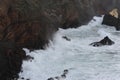 Waves breaking on the rocks of rugged Atlantic Ocean coast in Madeira Island, Portugal Royalty Free Stock Photo