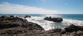 Waves breaking on rocky coastline at Cerritos Beach between Todos Santos and Cabo San Lucas in Baja California Mexico Royalty Free Stock Photo