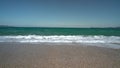 Waves breaking in Slow Motion on Greek Beach. Agean Sea in Greece