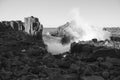 Waves breaking on stones, Bombo, NSW