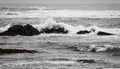 Waves breaking on stones off the coast of the Atlantic Ocean Royalty Free Stock Photo