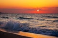 Waves breaking at sunset Royalty Free Stock Photo