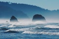 Waves and cliffs against the mountains