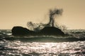 Waves crash against the rocks at sunset at Rialto Beach, Washington, US Royalty Free Stock Photo