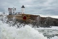 Waves Crash Around Cape Neddick (Nubble) Lighthouse As Storm Goes Out To Sea Royalty Free Stock Photo