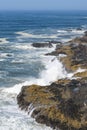 Waves crash ashore from the Pacific Ocean onto the Coast of Oregon Royalty Free Stock Photo