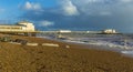 Waves crash onto the beach at Worthing, Sussex in late afternoon Royalty Free Stock Photo