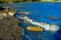 Waves crash on shore of the lake. Lac de Arc. Alberta,Canada Royalty Free Stock Photo
