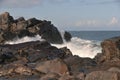 Waves crashing against rocks